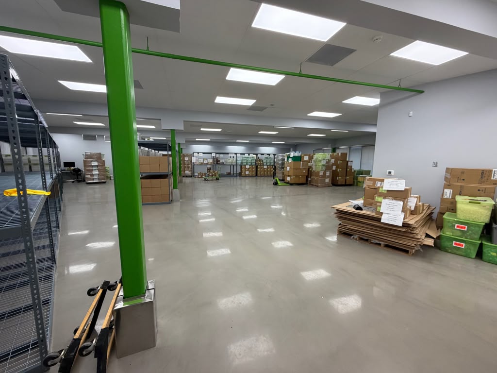 Industrial polished concrete with epoxy color tint finish