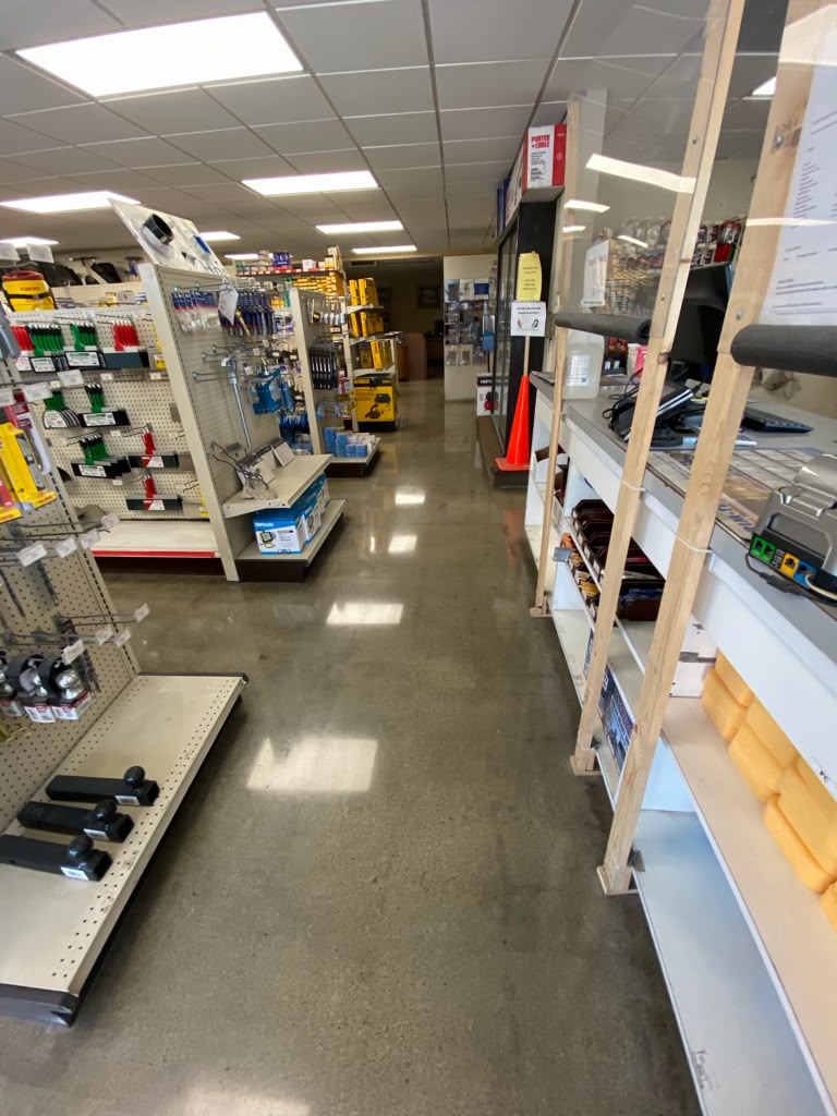 Retail polished concrete with multiple epoxy coloring tints