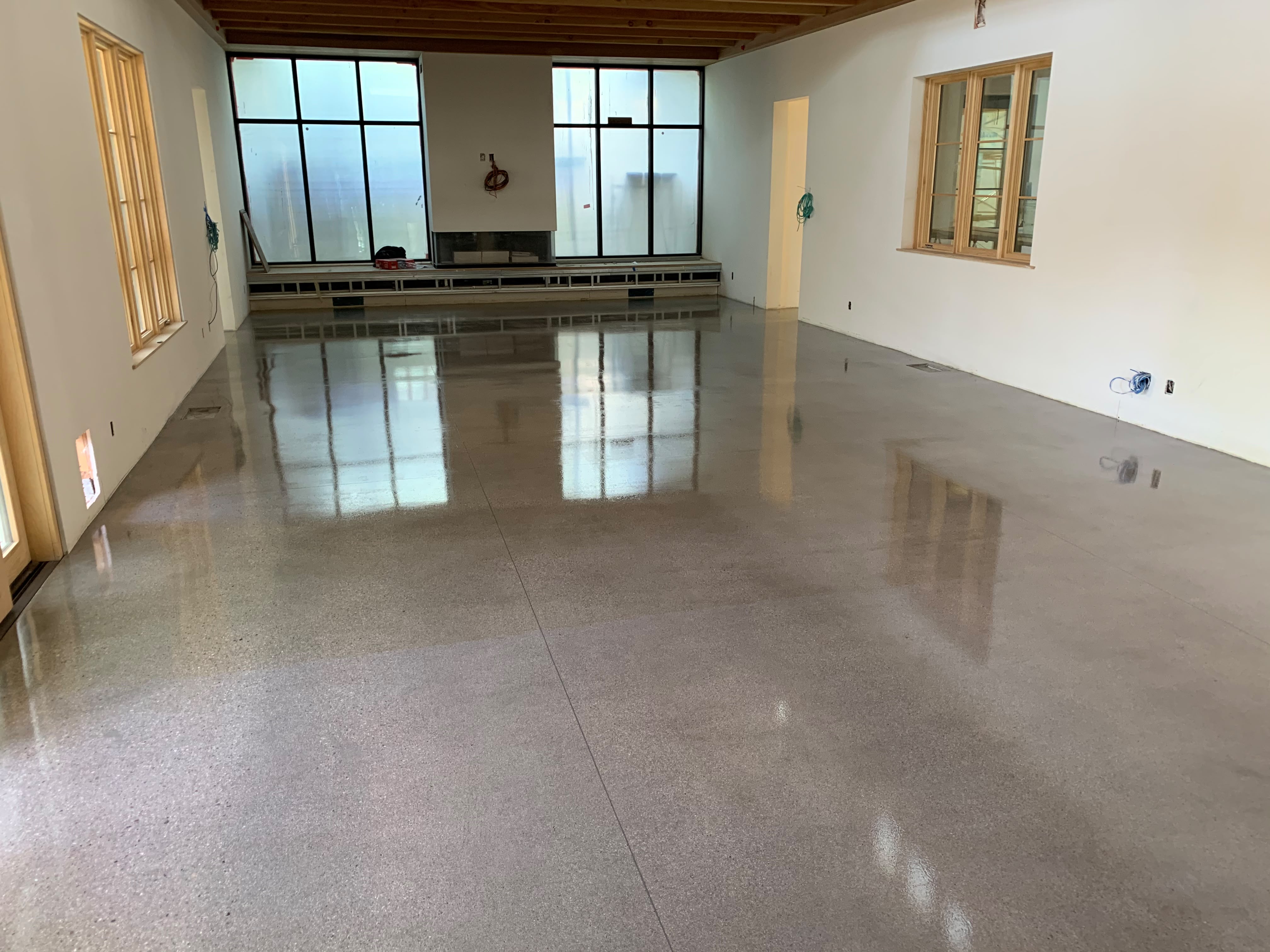 residential kitchen and dining room with concrete polished floors