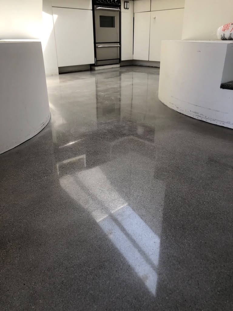 concrete polished floors in living room for residential home in orange county